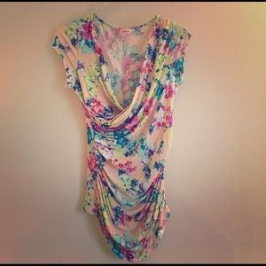 Extremely flattering Candies Floral Wrap Top!